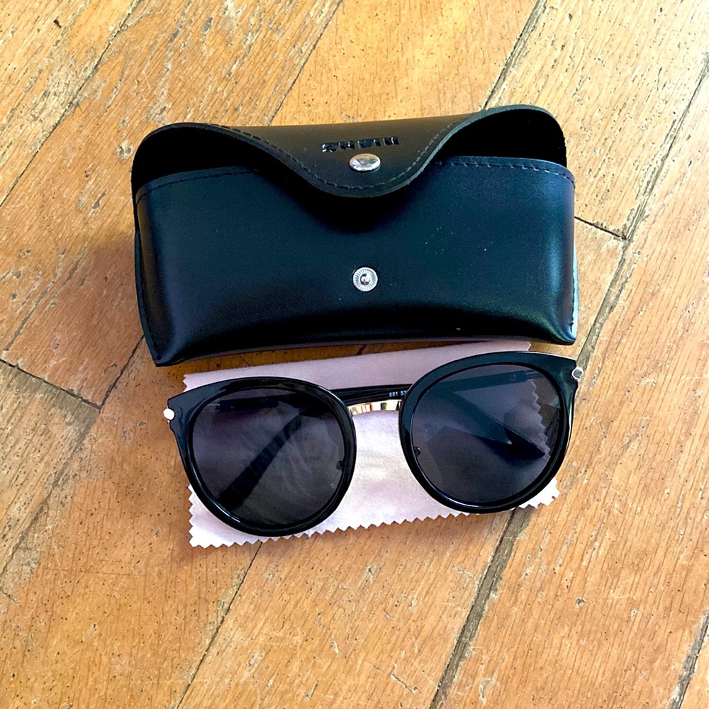 these are a pair of SHEIN sunglasses. colors are gold and black.